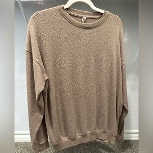 Popular sweater beige Alo Yoga. Still a classic